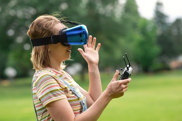 control with vr points in a quadrocopter in the park. concept of new technologies