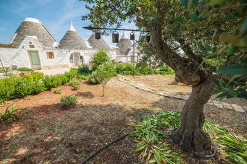 Trulli of the Itria valley. Details in the sky. Puglia, Italy.