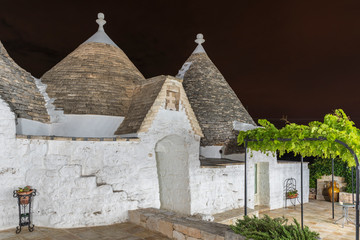 Night on the Trulli of the Itria valley. Puglia, Italy.