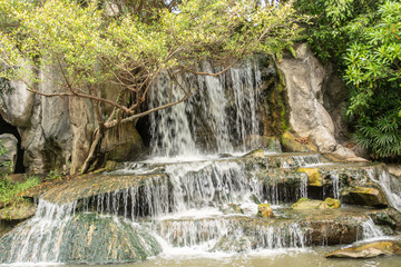 Small waterfall Built inside the garden to look naturally beautiful Within Thailand