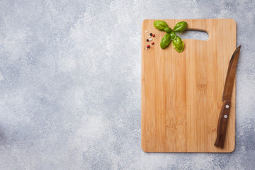 empty wooden cutting board on kitchen table. Top view copy space