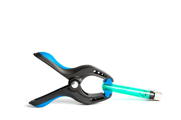 Black and blue plastic clamps isolated white background