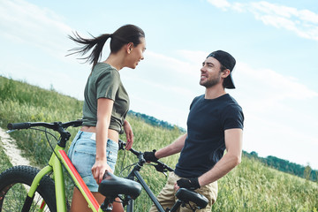 Obraz premium Romantic date on bikes, they like each other. Warm season