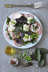 Healthy dietary salad with green peas, radish and white cheese. Keto diet. Keto Salad