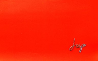 Christmas decoration closeup on red background