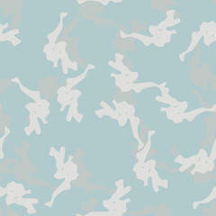 Winter camouflage of various shades of grey, blue and white colors