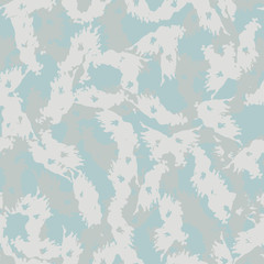 Fototapeta na wymiar Winter camouflage of various shades of grey, blue and white colors