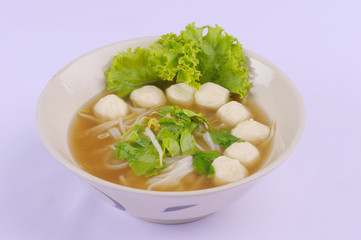 Spicy tom yum noodles with pork, thai noodles, Tom yum pork noodles soup on white background