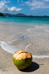 Fresh Coconut Cocktail the Beautiful Beach at Sunny Day
