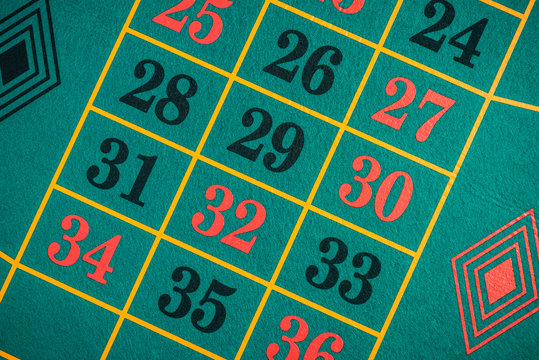 Overhead View Over Casino Roulette Felt Table With Lucky Numbers