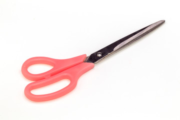 Pink scissor on isolated white background.