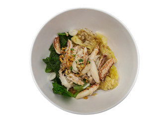 Dried egg noodles with steamed crab on isolate white background.Famous local Thai street food.