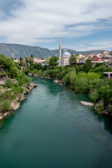 Fototapeta na wymiar Beautiful view on Mostar city on Neretva river in Bosnia and Herzegovina