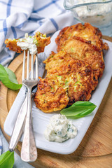 Plate with fritters from zucchini.