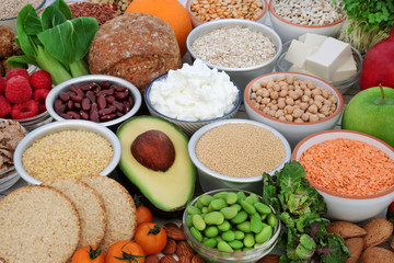 Health food for vegans with almond yoghurt,bean curd, legumes, grains, vegetables, fruit, cereals, nuts, seeds, oatmeal crackers & wholegrain bread. High in antioxidants, fibre, protein & omega 3.