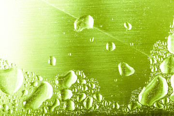 Drops of water on a color background. Gray. Shallow depth of field. Selective focus. Blur.