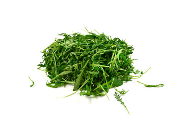 Fresh leaves of arugula as background.