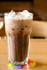 Cold chocolate on a wooden table