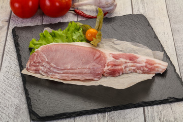 Raw pork bacon