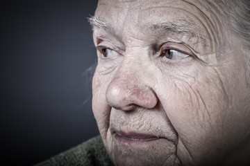 Portrait of elderly woman. Closeup view. Toned