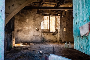 Fototapeta na wymiar Empty room. A glimpse of ghost town Alianello. Matera province, Italy