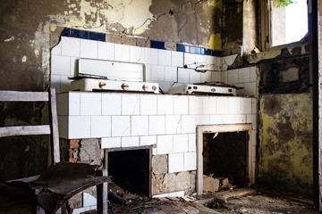 Old kitchen. A glimpse of ghost town Alianello. Matera province, Italy