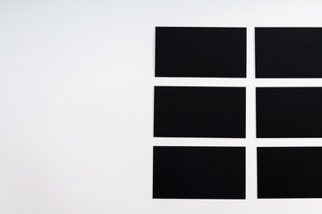 Photo of black blank business cards on a white background. Templ