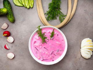 Velvety Beetroot soup on concrete background