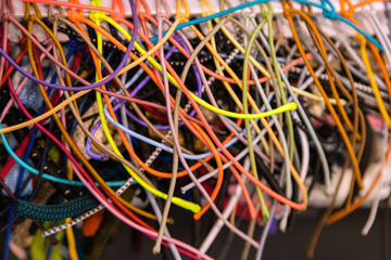 Colorful background of rainbow colors rubber bands on display in