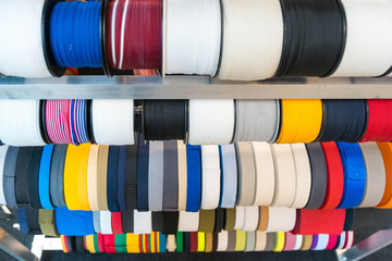 Colorful embroidery thread spool using in garment industry, row