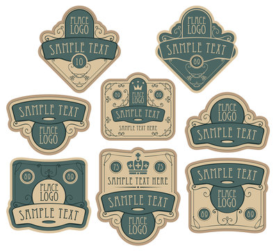 Set of ornate vector labels in green and beige colors in retro style, decorated by crowns, curls, in figured frames with place for text and logo.