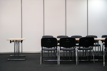 Plakat Empty business meeting room. Desk and chairs for decision making