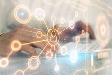 Social network theme hologram with businessman working on computer on background. Multi exposure.