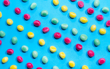 Pile of delicious colorful chewing candies background. Colourful