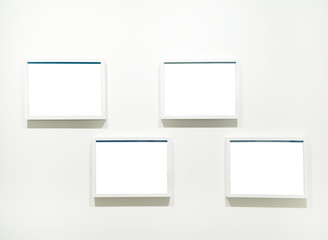 Empty Frames on the wall in modern art museum Gallery Exhibit Bl