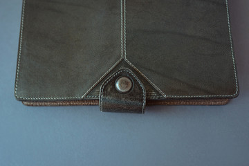 leather notebook on grey background