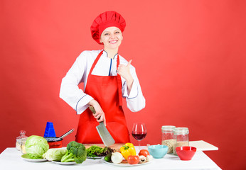 Woman chef hold sharp knife. Chop food like pro. Knife skills concept. Sexy aphrodisiac dinner recipes. Choose proper knife. Best knives to buy. Dangerous lady. Stainless steel. Be careful while cut