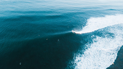 Aerial View of Waves and Surfers and Beach Landscape of Bells Beach Along the Great Ocean Road, Australia