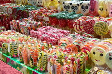 Handmade delicious colorful sweets - lollipops. Eco treat. Fair - an exhibition of folk craftsmen open air.