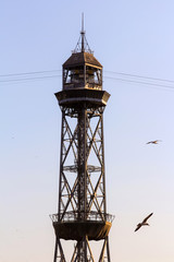 Fototapeta na wymiar Funicular tower with the lines isolated in blue sky with evening