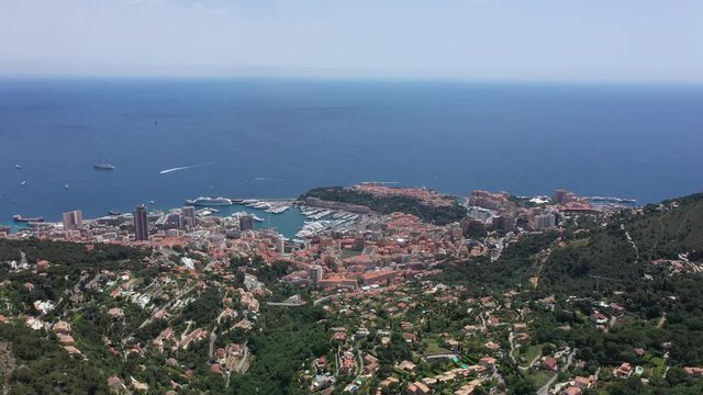 Large aerial view of Monaco, Cap-d'Ail, Beausoleil, Roquebrune-Cap-Martin, La Turbie mediterranean sea in background France sunny day