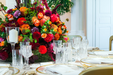 Wedding table decoration. Beautiful bouquet of flowers on the ta