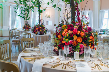 Wedding table decoration. Beautiful bouquet of flowers on the ta