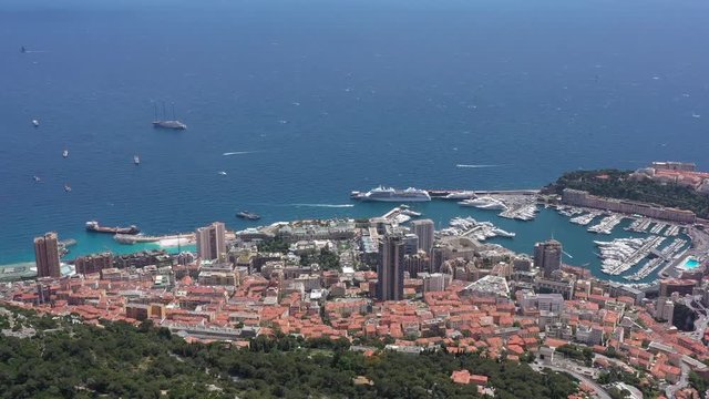 Aerial drone shot of Monaco harbor tax haven city France