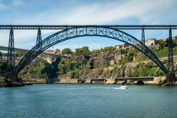 Embankment of Douro River with Bridge of Luis I and Prince Henry