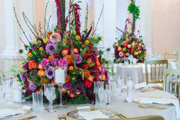 Wedding table decoration. Beautiful bouquet of flowers on the ta