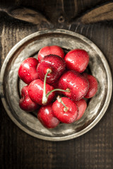 Organic Red Cherries with Fresh Water Drops as Summer Concept