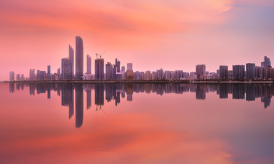 Fototapeta na wymiar View of Abu Dhabi Skyline on a sunny day, UAE