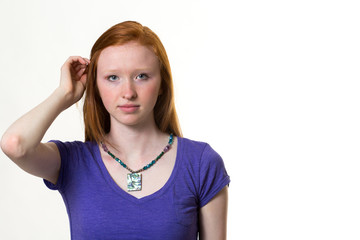 portrait of pretty redhead girl on white background