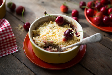 sweet pie. crumble with strawberries and red merry. Summer strawberry tart with crumble, top view
